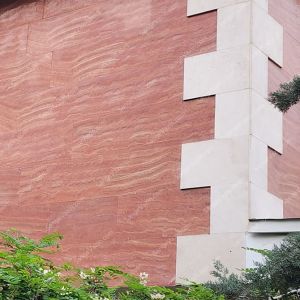 سنگ تراورتن قرمز در نمای ساختمان