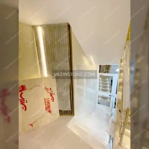 نصب ماربل شیت طرح سنگ در دیوار راه پله