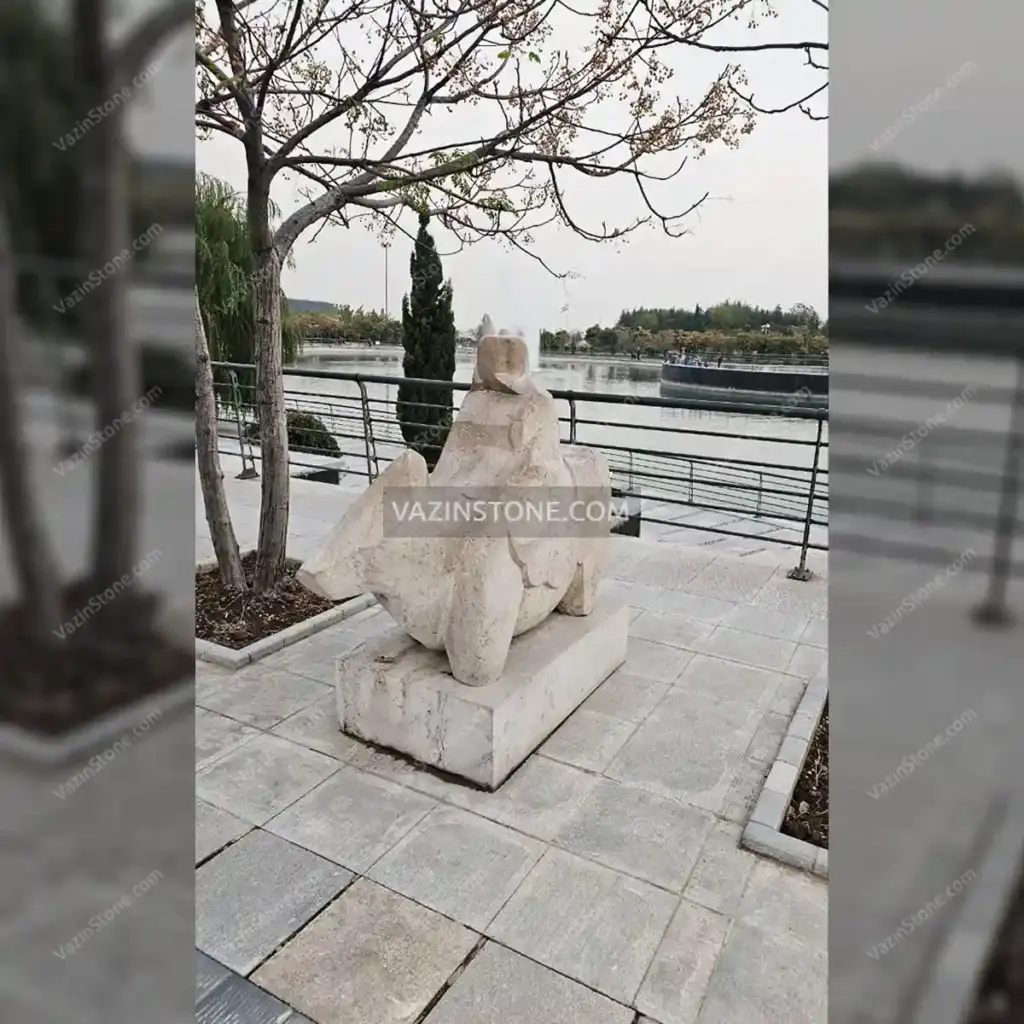 عکس مجسمه سنگی باغ کتاب