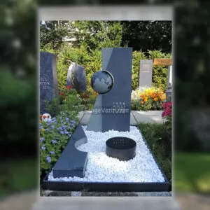 سنگ قبر مشکی با قلوه سنگ کره زمین